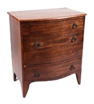 A 19th century mahogany bow fronted chest of small proportions, with four graduated long drawers,