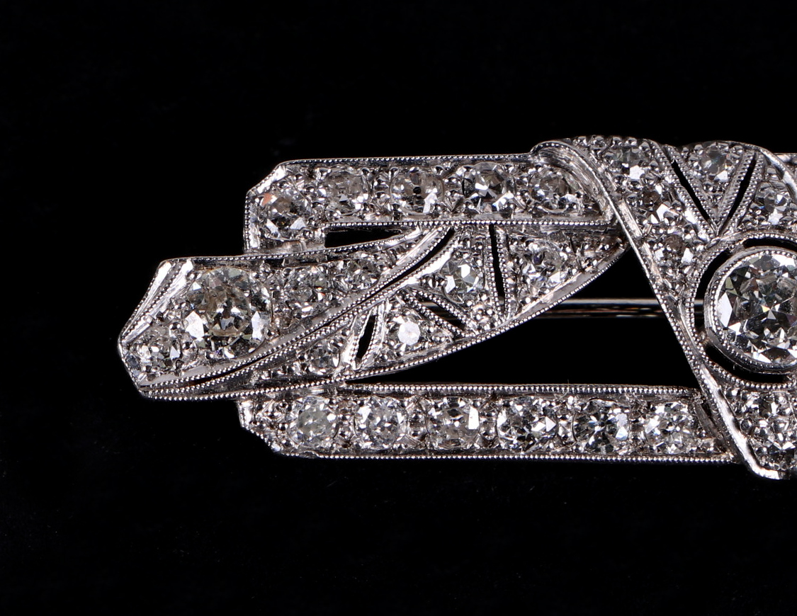 A white metal diamond set panel brooch, set with 48 diamonds, central diamond approx 4.5mm diameter, - Image 5 of 6