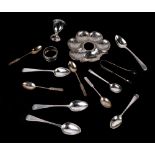 A quantity of silver teaspoons, a silver egg cup, a silver napkin ring and other items, various