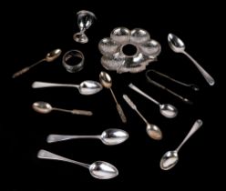 A quantity of silver teaspoons, a silver egg cup, a silver napkin ring and other items, various