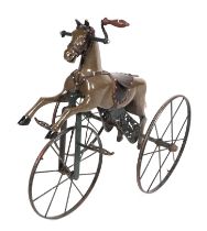 A 19th century French child's horse tricycle Velocipede, with a carved painted wooden body, cast