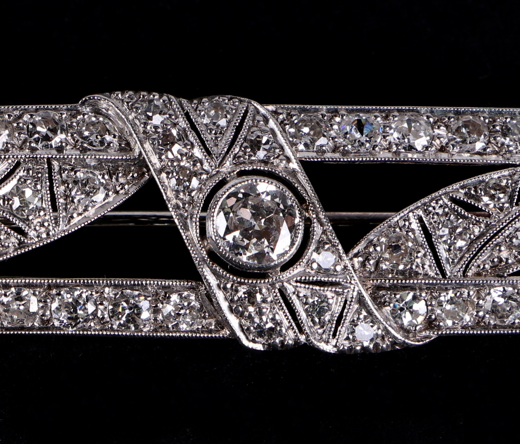 A white metal diamond set panel brooch, set with 48 diamonds, central diamond approx 4.5mm diameter, - Image 6 of 6