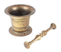 A brass pestle and mortar, 14cm diameter.