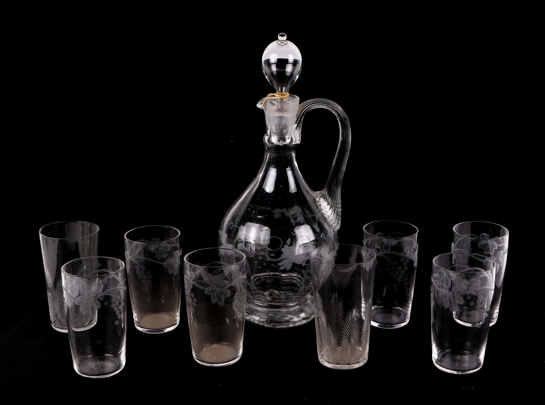 A set of 12 cranberry glass wine glasses, with matching carafe, a celery vase, a pair of spiral - Image 4 of 6