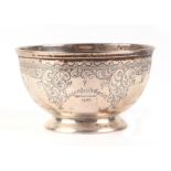 An Edwardian silver footed bowl, with engraved folate scrolls, London 1905, 130g.