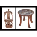 An African tribal carved hardwood Chieftain/throne chair, the back carved in the form of a man,
