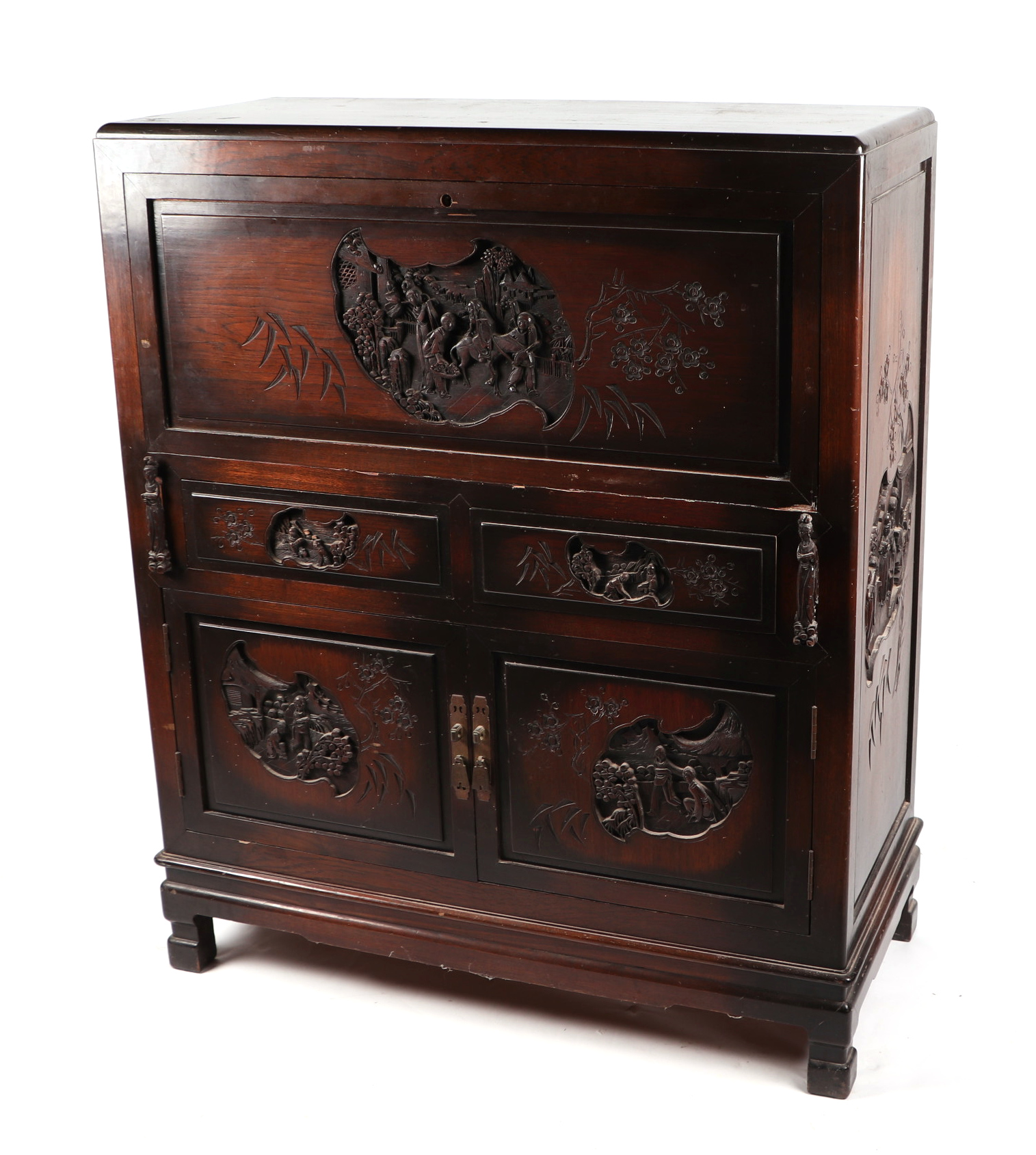 A Chinese hardwood writing cabinet, with carved panels, the full front enclosing fitted interior