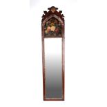 A George III style wall mirror, with arched painted panel to the top, depicting flowers, 21 by 91cm.