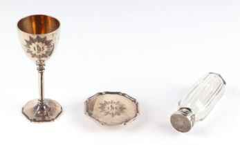 An early Victorian silver communion set, comprising chalice, paten and holy water bottle, London