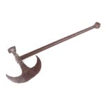 A 19th century Tabar Indo-Persian battle axe, with crescent blade, having a broad hammer head to the
