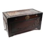 A Chinese carved camphor wood blanket box, 111cm.