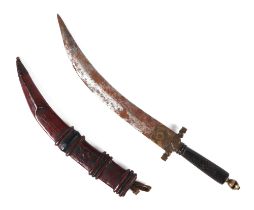 An Arabic/ North Africa jambiya dagger, in tooled leather sheath, 35cm long.