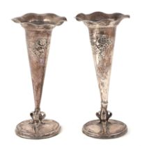 A pair of Art Nouveau loaded silver trumpet vases, decorated flowers, London 1900, 19.5cm high,