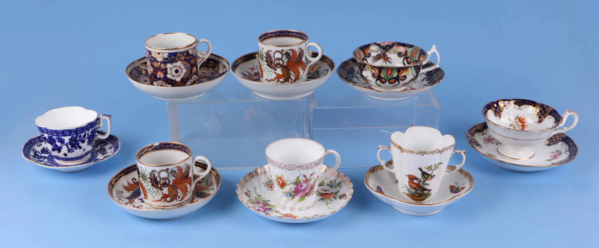 A group of cabinet cups, to include Dresden and Imari pattern. Condition Report The blue & white cup - Image 2 of 3