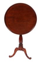 A 19th century mahogany tilt-top tripod table, the dished circular top on a turned column, 53cm