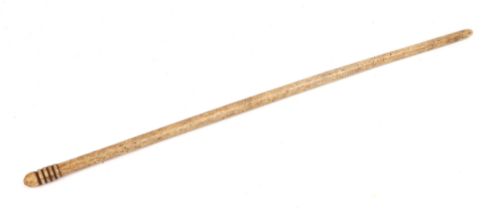 A 19th century turned bone conductors baton, 46cm long.