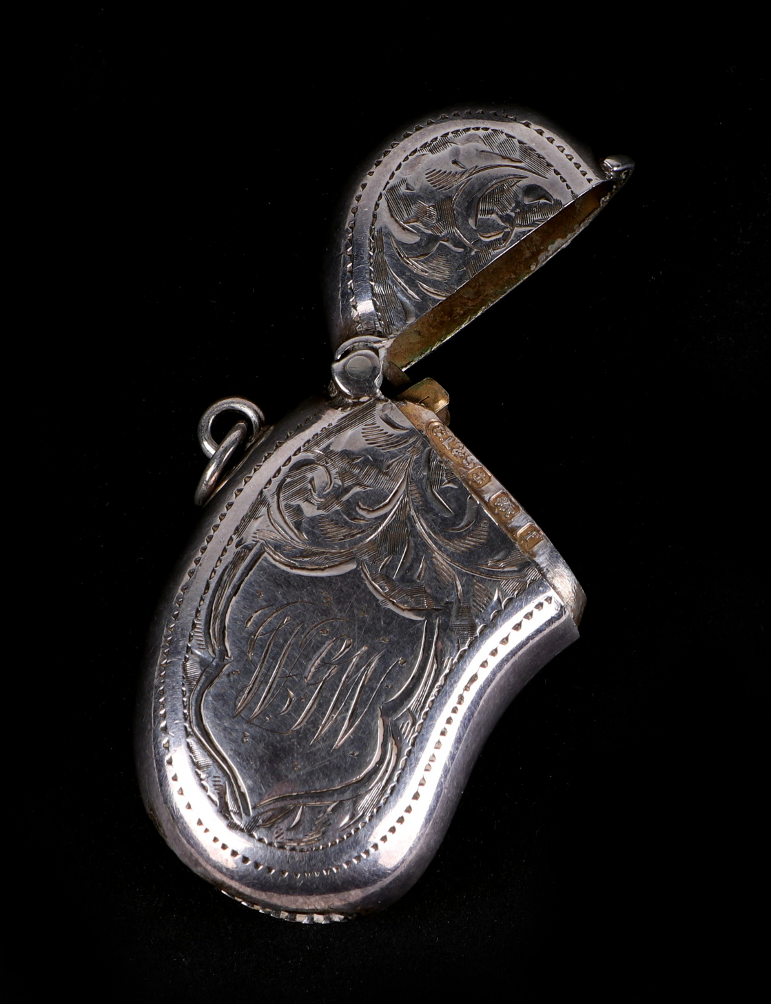 An Edwardian kidney shaped vesta case, with engraved decoration, initialled WGW, Birmingham 1905, - Image 3 of 3