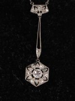 An early 20th century white metal mounted (probably platinum) diamond pendant necklace, the