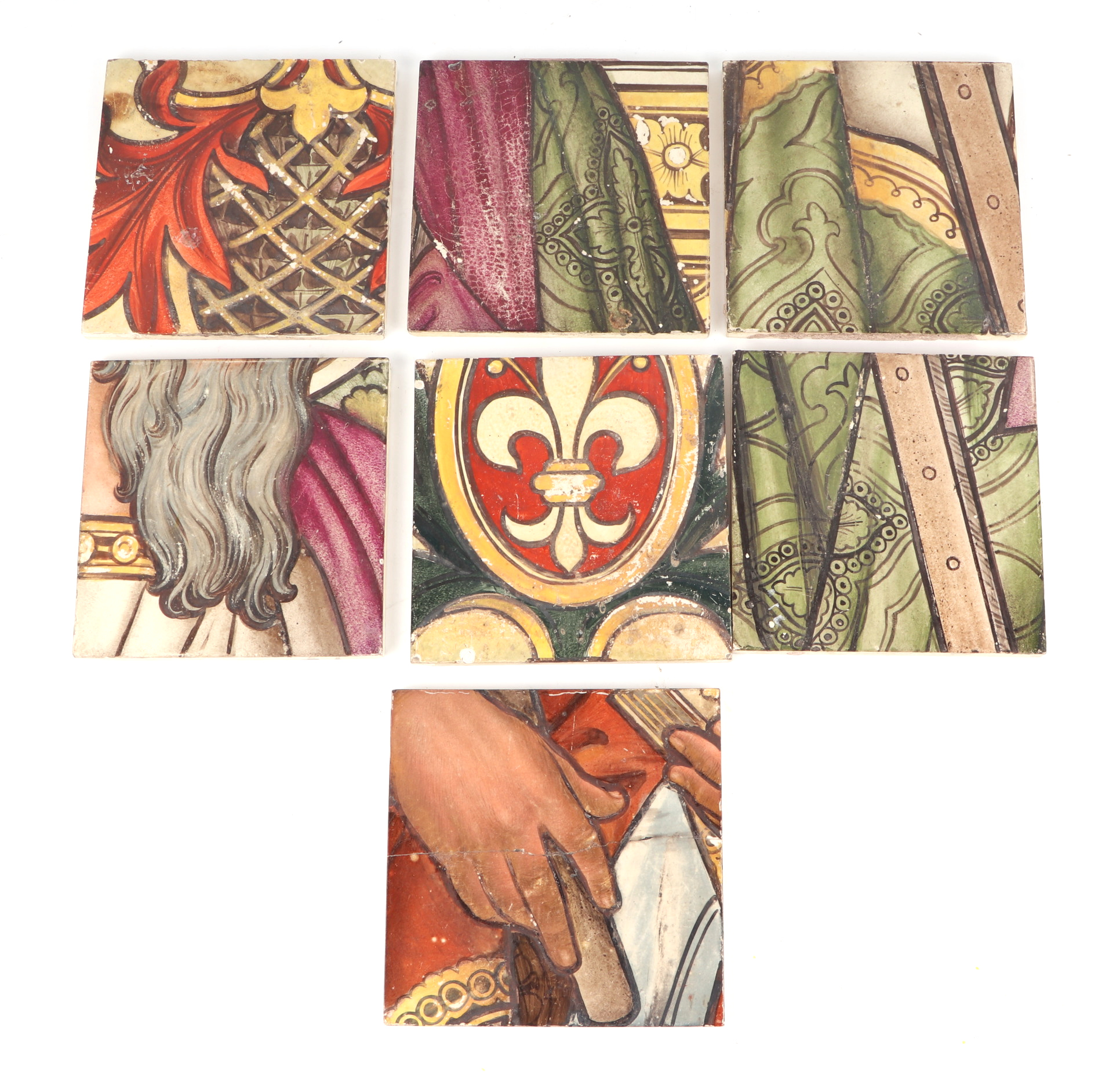 Seven Minton Holllins Victorian tiles decorated Fleur de Lys, drapes and part of a portrait,