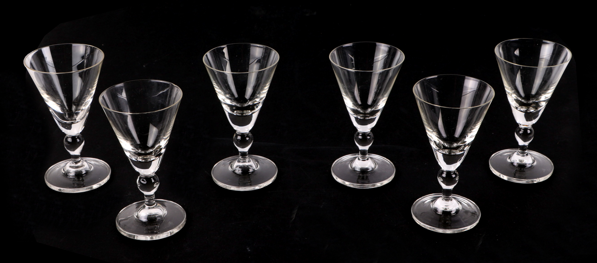 A set of 12 cranberry glass wine glasses, with matching carafe, a celery vase, a pair of spiral - Image 5 of 6