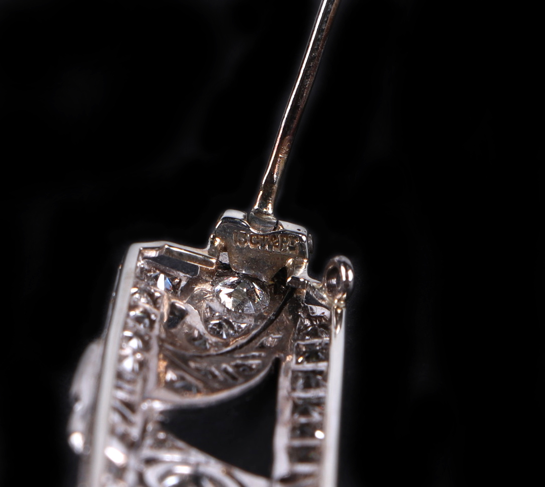 A white metal diamond set panel brooch, set with 48 diamonds, central diamond approx 4.5mm diameter, - Image 3 of 6