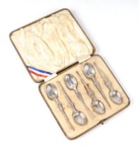 A cased set of six George V silver replica anointing spoons, 56g.
