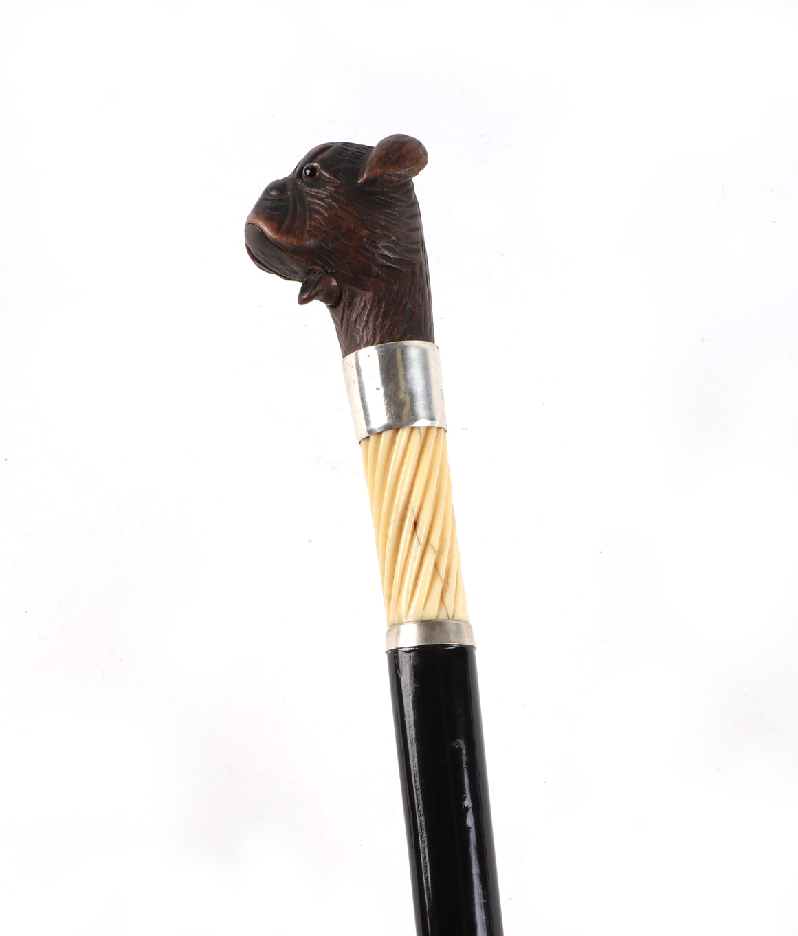 A Victorian ebonised walking cane, with silver collar and ivory section, having a carved soft wood - Image 3 of 5