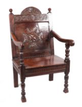 An 18th century style Wainscot type oak chair.