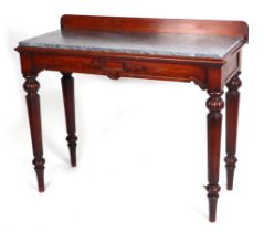 A William IV mahogany wash / serving table, having a marble inset top, above a single end frieze