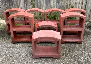 A set of six stackable two division concrete wine racks, together with two single division matching,