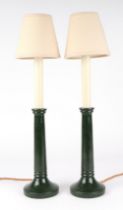 A pair of wooden painted mottled green candle stick form table lamps, 42cm high (2).