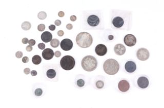 A 1780 Maria Teresa silver thaler, a 1797 George III cartwheel penny, silver and other coins.