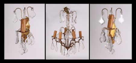 A glass and gilt metal six branch chandelier, with prismatic drops, approx 34cm wide, and two