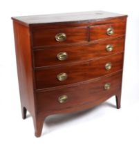A 19th century mahogany bow fronted chest, with two short and three graduated drawers, standing on