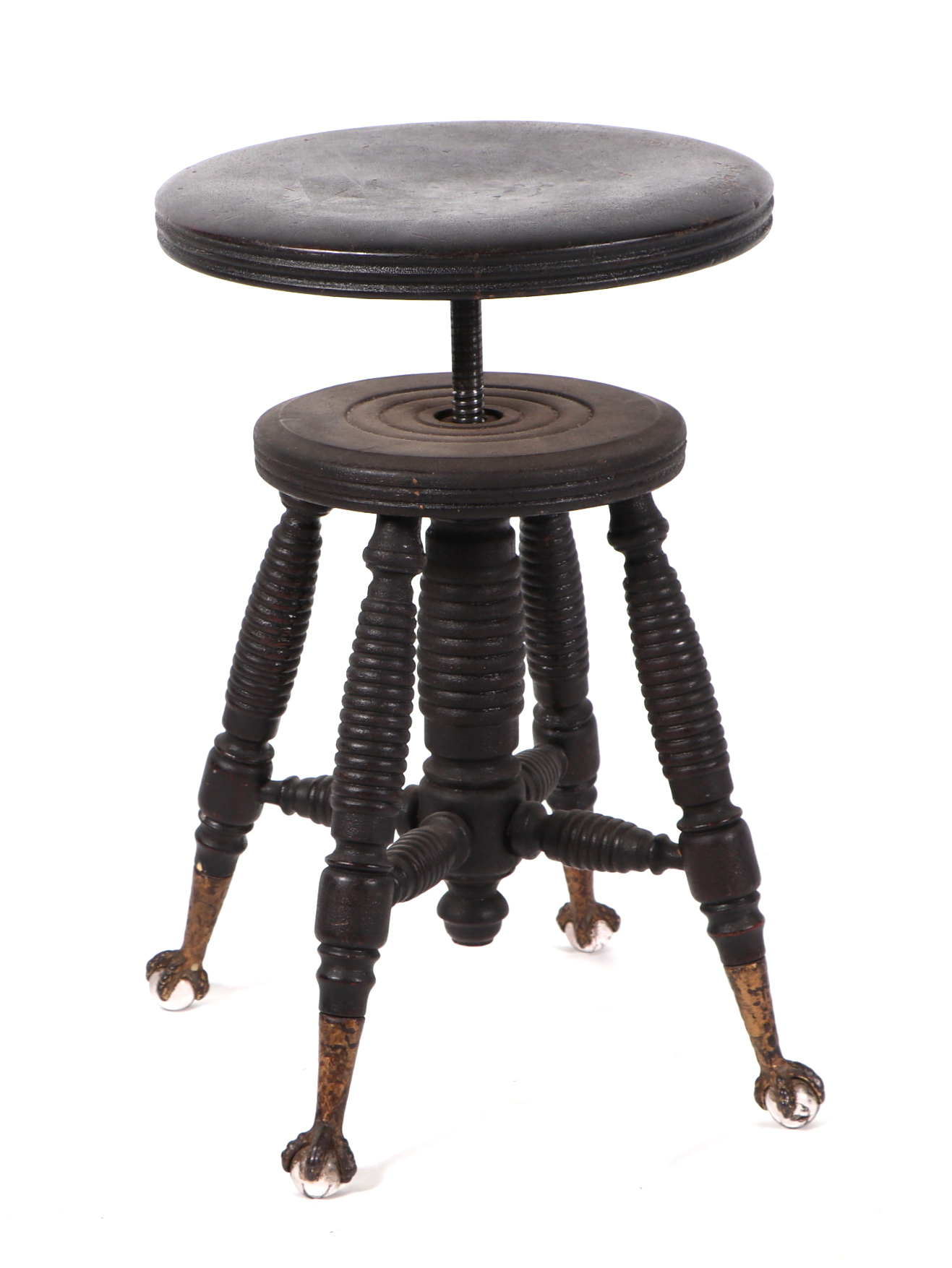 A late 19th century painted wooden stool, with rise and fall adjustable seat, on turned legs with