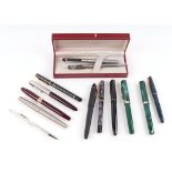 A group of fountain pens and other pens to include Parker and Shaeffer.