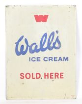 A vintage printed tin, WALL'S ICE CREAM SOLD HERE advertising sign, printed by Franco S.W, 61 by