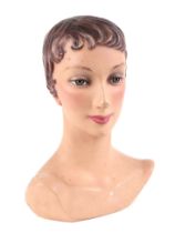 A 1950s French Jewellery's shop mannequin head, composition (gutta percha), with original finish,