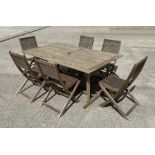 A teak refectory style garden table, having a rectangular top, on trestle type supports, 180cm long,