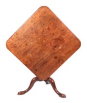 A 19th century mahogany top tripod table, having a rectangular top on bird cage topped column,