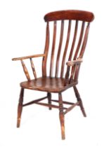 A 19th century Windsor open arm chair, having a solid elm seat, turned front legs, joined by a H