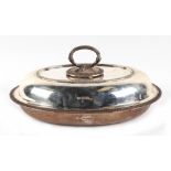 A George V silver oval entrée dish and cover, Sheffield 1924, 26cm wide, 1054g.