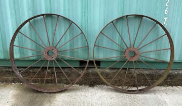 A large pair of iron spoke cart wheels, 121cm diameter (2),