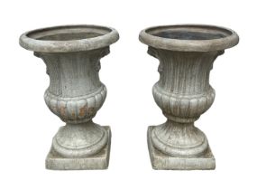 A large impressive pair of crackle glazed pottery Campana urns, with lion mask handles, 98cm high (