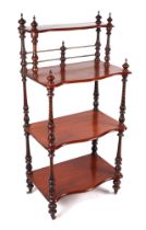 A Victorian mahogany four tier whatnot, on turned supports, 55cm wide.