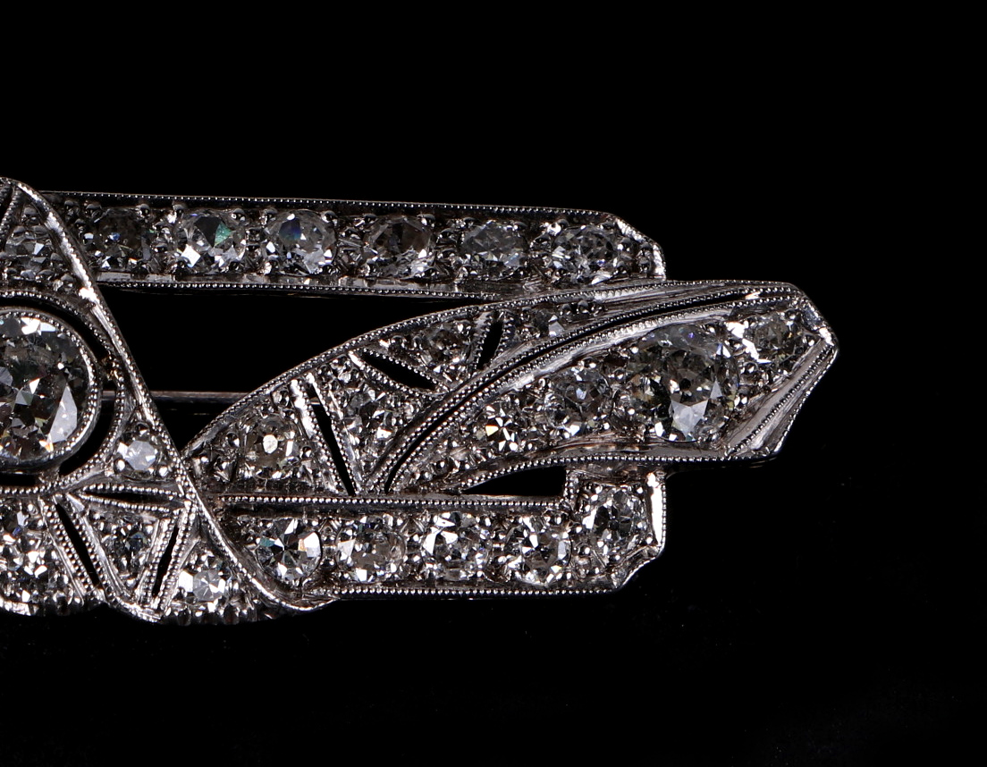 A white metal diamond set panel brooch, set with 48 diamonds, central diamond approx 4.5mm diameter, - Image 4 of 6