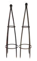 A pair of well weathered, heavy iron strap work garden obelisks, with ball finial, each approx 200cm