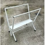 A white painted metal folio/poster stand, 102cm wide.
