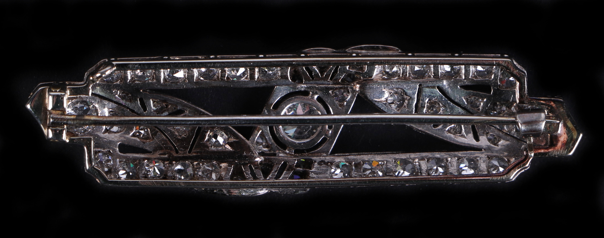 A white metal diamond set panel brooch, set with 48 diamonds, central diamond approx 4.5mm diameter, - Image 2 of 6