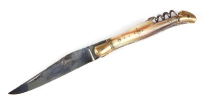 A Laguiole type pocket knife with 9cm blade, corkscrew, pick and horn handle, the blade signed "